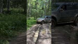 Mitsubishi Pajero Sport 2 2.5 MT in forest