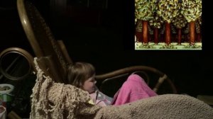 Девочка смотрит мультик "Принцесса и Людоед"