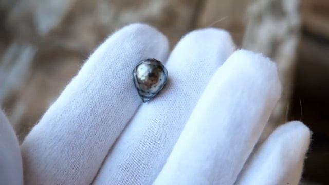 Драгоценные камни Баснословно: Огранённый чёрный жемчуг из Таити 14,66х11,09мм 10,59 карат смотреть онлайн