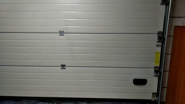 Регулировка привода секционных ворот.