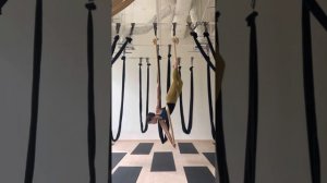 Aerial yoga hammock flow cross back straddle entry