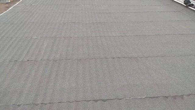 Ремонт профнастильной кровли, покрытой наплавляемой кровлей.