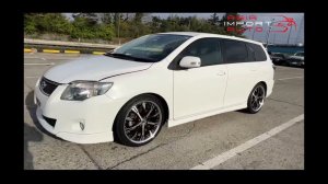 Toyota Corolla Fielder автомобиль на нашей стоянке в городе Тояма (Япония)