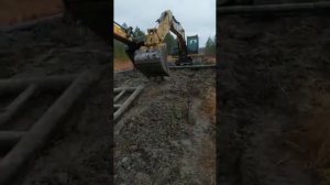 Аренда экскаватора, работа на севере, болото, подряд, сложно, слани