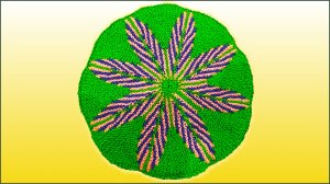 Жаккардовый коврик укороченными рядами спицами. Жаккардовый узор спицами.