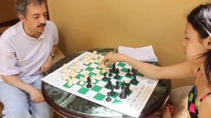 Ashley Tapp (CHESS GIRL) and GM Eduardas Rozentalis