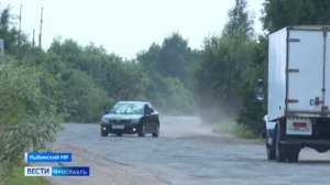 Разбитый асфальт деревни Поповское в Рыбинском районе