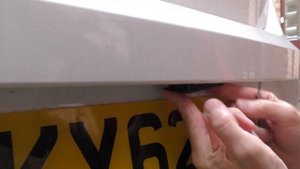 2012. Seat Ibiza 1.4se. Number plate light bulb change.