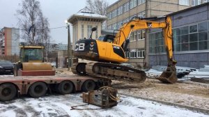 Экскаватор и трал