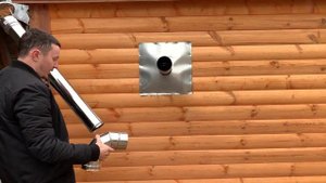 Установка трубы в бане и первая протопка