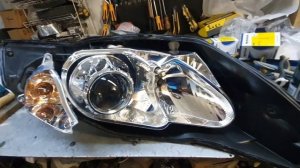 Ford Mondeo. Установка биксеноновых линз Hella 3R под лампы D2S со скрытой установкой.