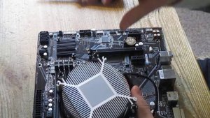AMD CPU cooler installation. How to install AMD AM4 processor and AMD Wraith cooler on motherboard.