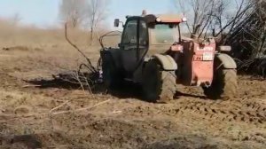 Корчеватель на Маниту