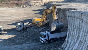 Caterpillar 6015B Excavator Loading Mercedes And MAN Trucks - Sotiriadis Mining Works
