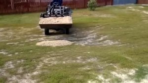 функциональный трактор-погрузчик  (ковш челюстной)