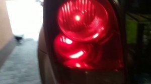 как заменить лампочку в подсветке номера и задней фаре на SsangYong Rexton