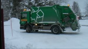 Garbage truck Scania collect garbage outside Visby 2012