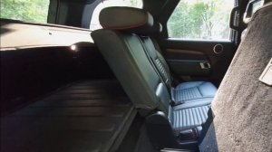 Доступ в багажник со стороны второго ряда в Дискавери 5