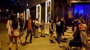 Party on the streets at night Medellin Colombia Lleras Park