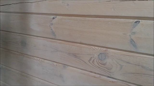 Контроль нанесения и пигментации Масловоск Анта на стене дома