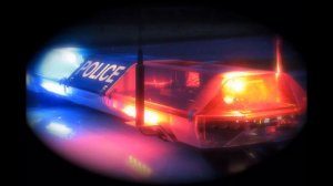 Звук сирены полицейской машины.The sound of a police car siren.