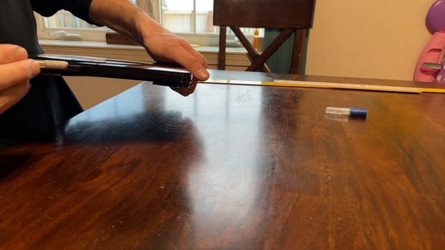 Vinyl wrapping my Apple MacBook Pro lid Gloss Vvivid Demon Black