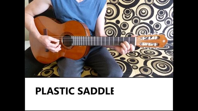 Bone vs Plastic saddle on Yamaha CS40 3/4 size classical guitar смотреть онлайн