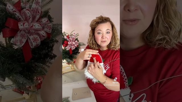 How to attach a Santa plush to a wreath ???