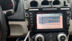 Mazda cx7 radio/navi and climate cntr removal