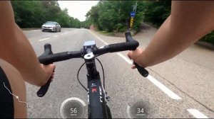 Спуск с Медео на шоссейном велосипеде, вид от груди