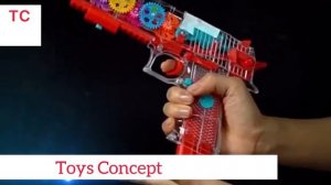 Пистолет музыкальный светящийся с шестеренками