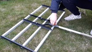 Садовый инструмент для выравнивания газона.