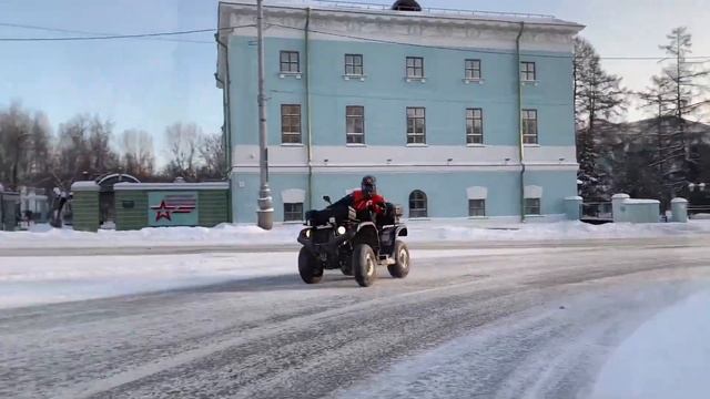 Квадрицикл Baltmotors Striker 500 EFI в снежном городе