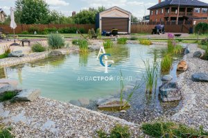 Плавательный пруд с пляжной зоной от Аквастройгранд