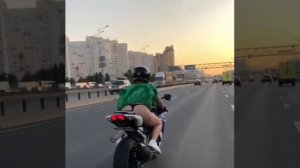 Девушка в стрингах на мотоцикле