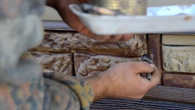 Покраска штукатурки под камень