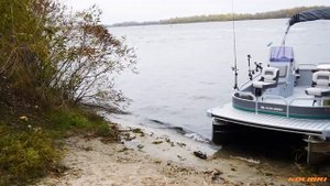 Рыболовный понтонный катер "КОЛИБРИ" P-500F  / KOLIBRI Fishing Pontoon Boat P-500F on a wave