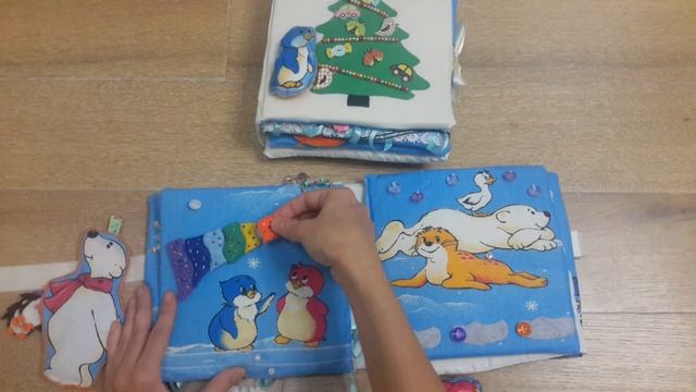 Развивающая книга из ткани и фетра ручной работы "Зимние приключения пингвинов" смотреть онлайн