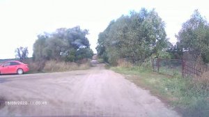 Авто Лавка одежды у магазина в посёлке.