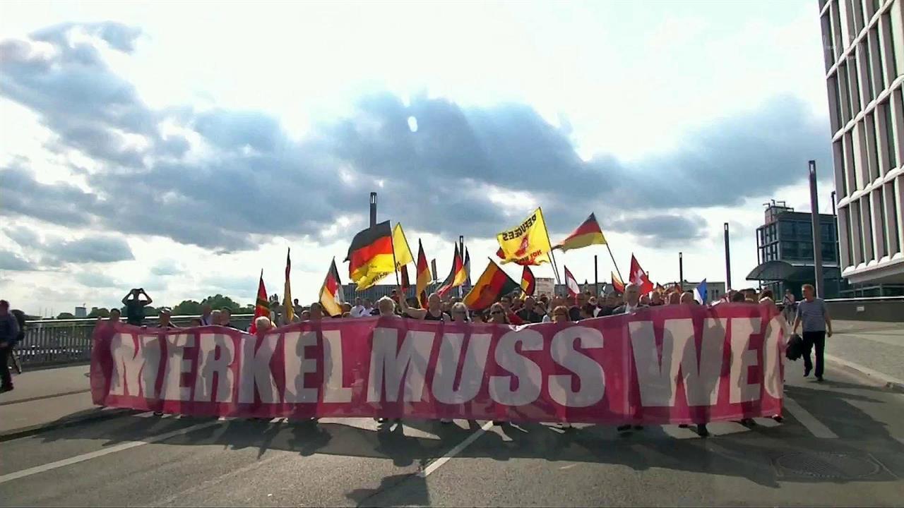 В Германии "политика открытых дверей" в зеркале опросов отразилась не в пользу Ангелы Меркель