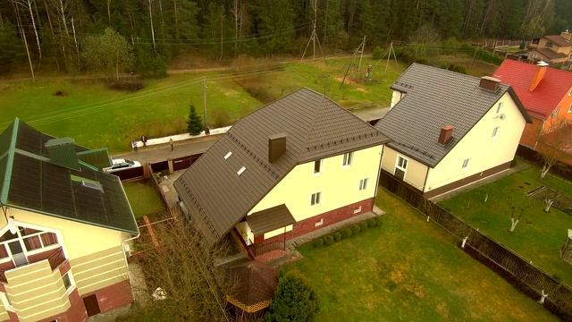 Реконструкция кровли в Валерьяново Минский район. Замена ондулина на модульную металлочерепицу.