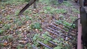 Самодельный погрузчик на заднюю навеску трактора. Обзор конструкции