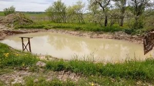 Копка пруда экскаватором JCB JS240