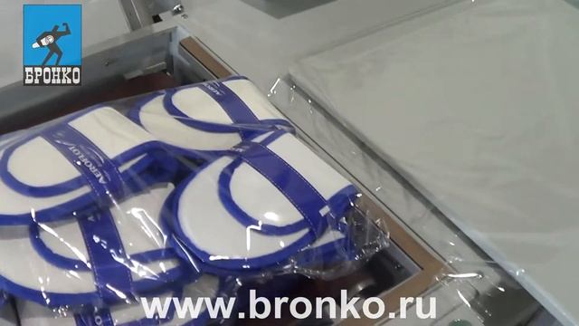 Упаковка одноразовых тапочек по 25 штук на термоусадочной машине без термотуннеля смотреть онлайн