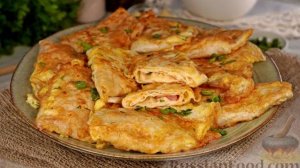 Хрустящая корочка, сочная начинка.
КОНВЕРТИКИ ИЗ ЛАВАША С ПОМИДОРАМИ