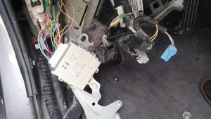 LEXUS B2411,B2410 HEADLAMP SWIVEL ECU LOCATION.