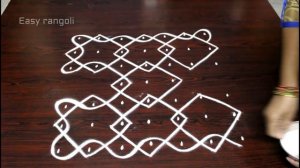 tulasi kota/ design muggulu with 7x7 straight dots || tulasi planter/pot design kolam ||easy rangol