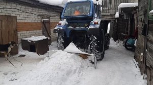 т 40 с кабиной мтз чистит снег