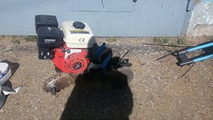 Мотокультиватор переделанный. Установлен двигатель /ЛИФАН/ и сделана задняя передача.