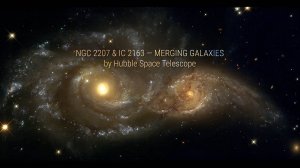 Сливающиеся галактики NGC 2207 and IC 2163. Телескоп Hubble